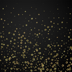 Gold sparkling star confetti.