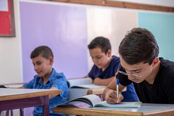 Students in class room doing exercise