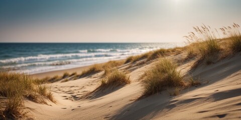 Seascape with sand dunes and sea at bright sunny day.