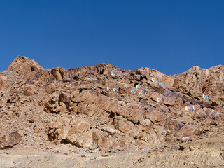 Close-up fhoto of a decorated stone in Qomolangma National Nature Preserve also known as the Chomolungma Nature Reserve (QNP), Tibet, China