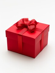Obraz premium The classic combination of a red gift box with white ribbons offers a timeless appeal, suggesting a gift given with care and affection.