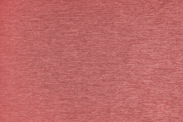 Closeup, macro of red fabric texture background. Satin weaving cloth structure, canvas