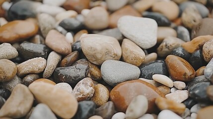  White, brown, black, and gray rocks stacked on top of each other in various shapes and colors