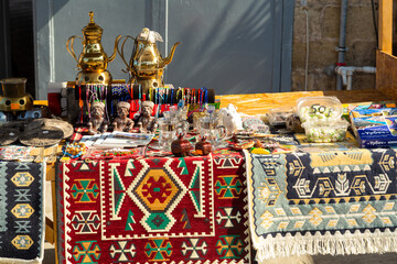 Handmade carpets and vessels other souvenirs at the oriental bazaar