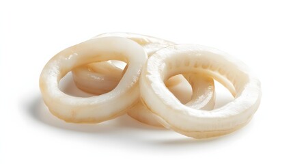 7. Sliced calamari rings showcasing their smooth texture and slight translucency, isolated on a clean white background