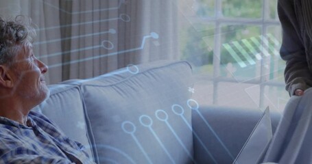 Animation of data processing over senior caucasian couple smiling at home - Powered by Adobe