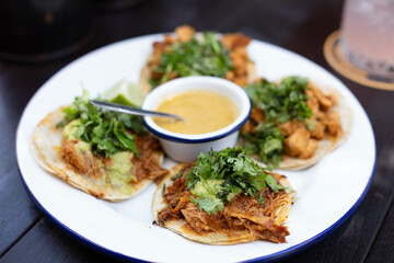 Mexican tacos with beef, tomatoes and cheese.