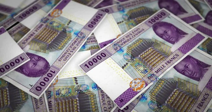 Central African CFA Franc money Cameroon Chad Congo growing pile of money. XAF banknotes loop rotaring. Seamless and looped background concept of finance, economy crisis, inflation and business.