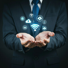 Man in Suit Holding Cloud Technology with Wi-Fi, Global Connectivity, and Communication Icons