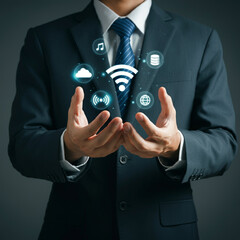Man in Suit Holding Cloud Technology with Wi-Fi, Global Connectivity, and Communication Icons