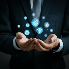 Man in Suit Holding Cloud Technology with Wi-Fi, Global Connectivity, and Communication Icons