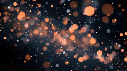 Obraz premium Scattered gradient peach to charcoal particles against a dark backdrop create a soft, sophisticated celebratory background