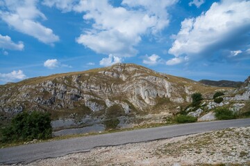 Mountain landscape with rocky hill and blue sky. Durmitor National Park. Montenegro