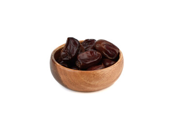 Dehydrated date fruits in wooden bowl on white background.