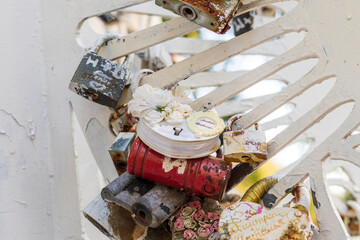 Metal structure where couples locking the locks as a sign of true love. Concept