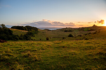 Scenic landscape at Glumsl&ouml;vs Backar / Hillesh&ouml;gs Dalar nature reserve in Sweden at sunset.