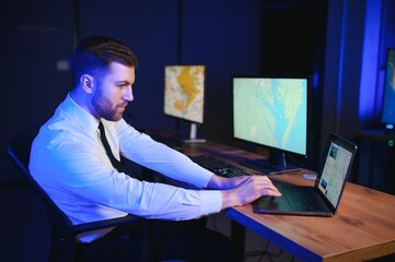 Center of dispatching maintenance. Portrait of cheerful woman and man working via headset...