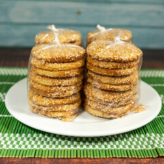 sesame crackers on a plate, oriental dessert