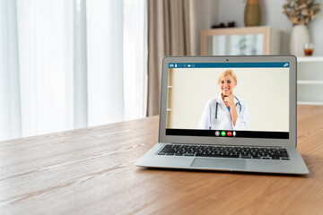 Doctor video call online by modish telemedicine software application for virtual meeting with patient
