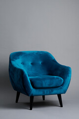 Comfortable blue armchair sofa as room decoration and style. Luxury chair