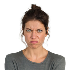 Fototapeta premium Portrait of a woman with an angry expression, isolated on white background. She has dark hair pulled back and is wearing a gray shirt.