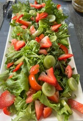 Strawberry salad with green grapes