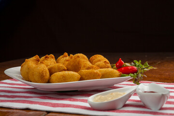 Traditional Brazilian snacks coxinha. Chicken coxinha, chicken Brazilian snacks