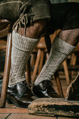 Traditional Bavarian shorts and socks on a man in Germany on the eve of Oktoberfest