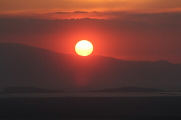 Golden Dusk Beneath a Cloudy Sky