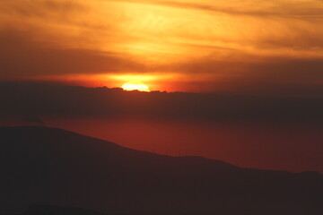 Golden Dusk Beneath a Cloudy Sky