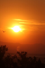 Golden Dusk Beneath a Cloudy Sky