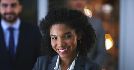 Face, confidence and black woman in business with team in office, company or workplace at night. Portrait, leadership and group of professional lawyers in collaboration for legal case with bokeh.