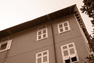 Windows on the building. Sepia. Vacation street photo