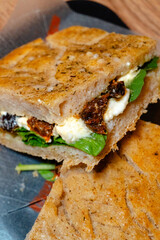 sandwich with vegetables and boconccino