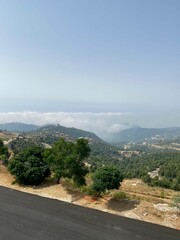 road in the mountains above the clouds