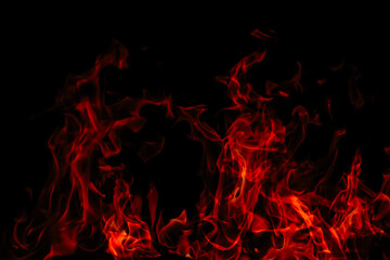 fiery wallpaper.Flame background. Fire texture on black background.Flames on a black background....