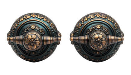 Obraz premium Two antique door knobs featuring intricate, ornate designs, showcasing vintage craftsmanship and elegance.