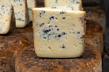 Pieces of tasty Blue Basque Fume smoked sheep cheese produced in south-western France, Northern Basque Country