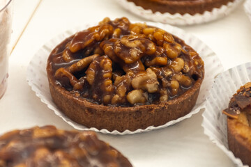 Round walnuts cakes Noix Perigord with walnuts from Dordogne, French sweet desserts