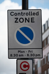 Transportation in London city, roads, road signes, street signes, warnings, indicating of directions in Great Britain, city life in England