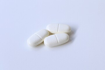 Group of tablet drugs on white background