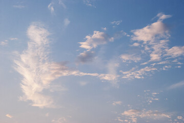 gentle white clouds in the blue sky