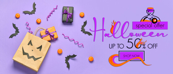 Composition with shopping bag, gifts and Halloween decorations on lilac background
