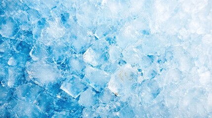 Obraz premium The surface is covered with various blue ice crystals that reflect light, forming a textured abstract background evoking a wintry atmosphere