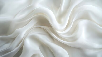 Obraz premium Soft white silk fabric with elegant folds, close-up texture. Luxury textile and design concept