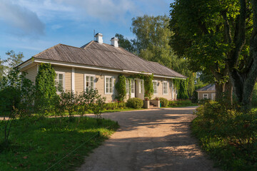 View of Mikhailovskoye estate of the Pushkin Museum-Reserve on a sunny summer day, Pushkinskiye...