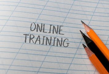 A piece of paper with the words Online Training written on it