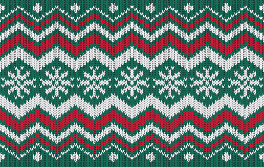 Knitted pattern seamless fabric Christmas on green. traditional knitted pattern snowflakes winter concept. Designed for background ,wallpaper ,clothing ,knitted pattern ,fabric ,embroidery ,textile