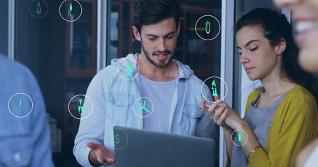 Image of eco icons and data processing over diverse business people in office