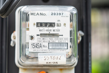 Electric measuring power meter for energy cost at home and office.